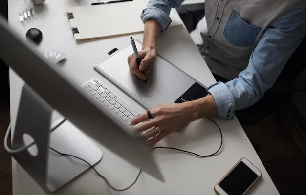 A man works on a computer